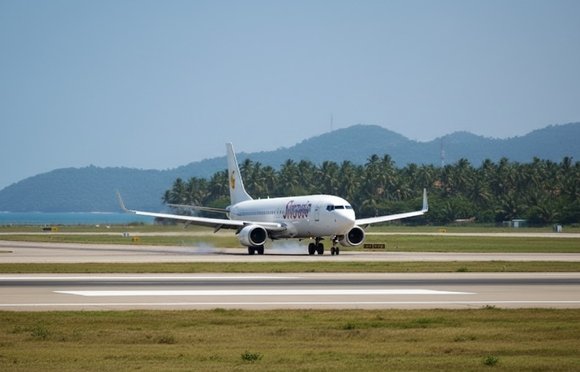 Airplane arriving at airport